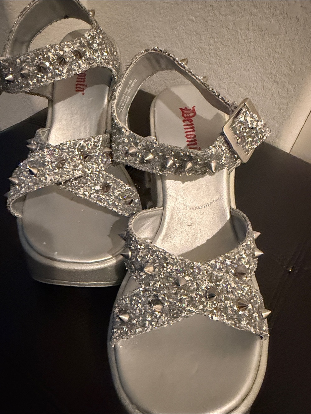 Very good condition. Gorgeous Demonia Silver Glitter Spike Platform Sandals